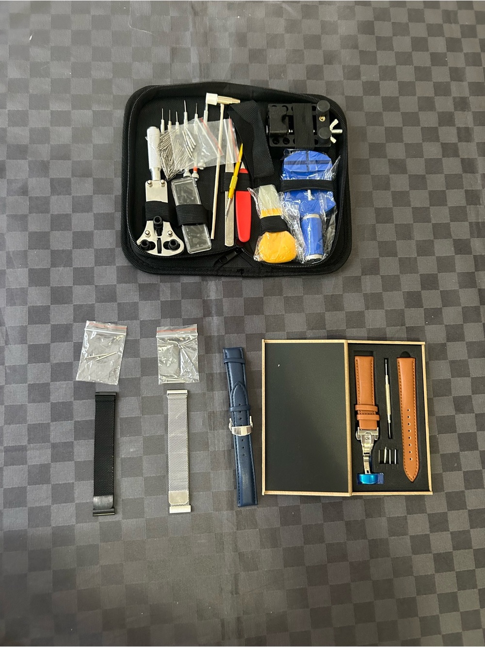 100 piece watch kit with 4 watch straps